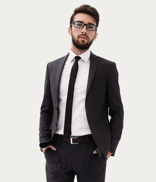 Young businessman standing with hands in pockets. - Photo, image