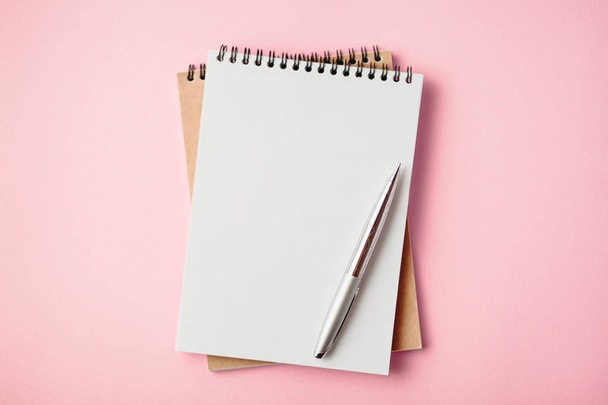 school notebook on a pink background - Foto, imagen