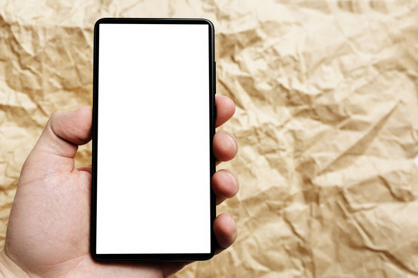 phone in hands on isolated, frameless phone, smartphone with thi - Photo, Image