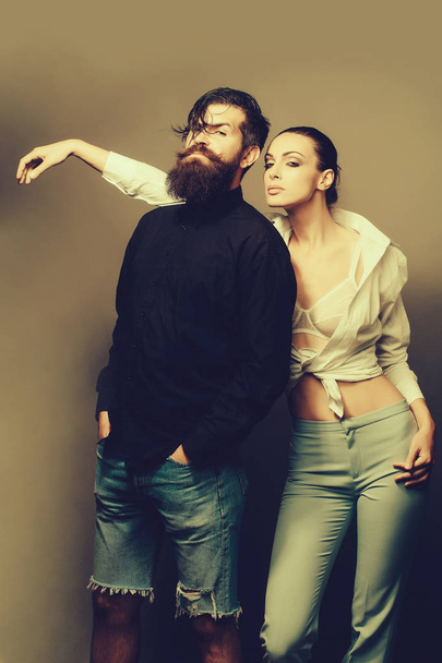 young stylish couple in studio - Fotoğraf, Görsel