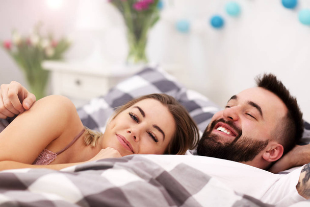 Adult attractive couple in bed - Fotoğraf, Görsel