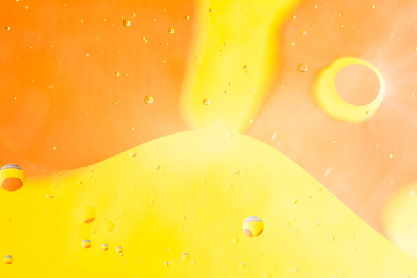 mixing water and oil, beautiful color abstract background based on circles and ovals - Photo, image