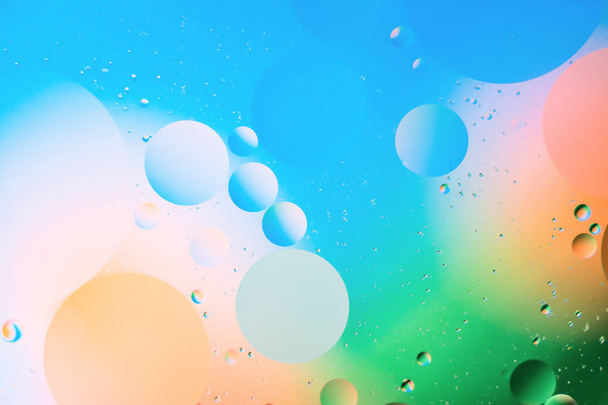mixing water and oil, beautiful color abstract background based on circles and ovals - Foto, Imagen