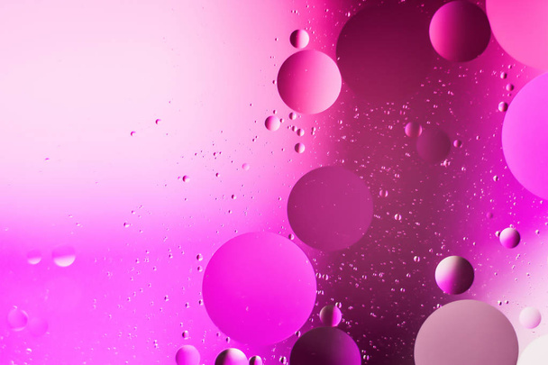 mixing water and oil, beautiful color abstract background based on circles and ovals - Фото, зображення