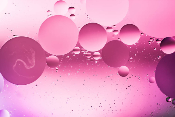 mixing water and oil, beautiful color abstract background based on circles and ovals - Foto, imagen