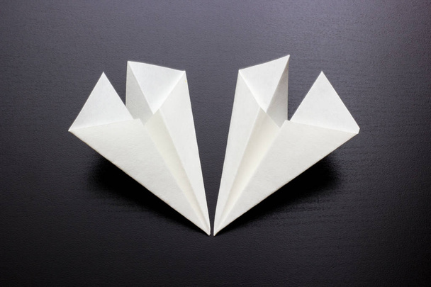 paper air plane on dark background for design - Фото, зображення