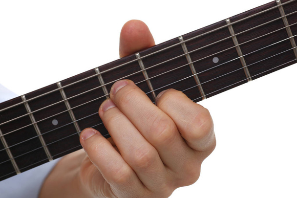 Чоловічі руки грають класичну електричну гітару
 - Фото, зображення