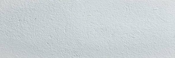 Grungy pintado textura da parede como fundo. Fundo de parede vintage de concreto rachado, parede pintada de branco velho. Fundo lavado pintura
. - Foto, Imagem