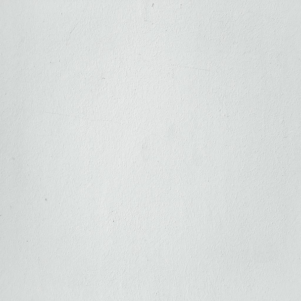 Grungy χρωματισμένο τοίχο υφή ως φόντο. Ραγισμένο μπετόν τρύγου τοίχο υπόβαθρο, παλιά Λευκός βαμμένος τοίχος. Φόντο πλένονται ζωγραφική. - Φωτογραφία, εικόνα