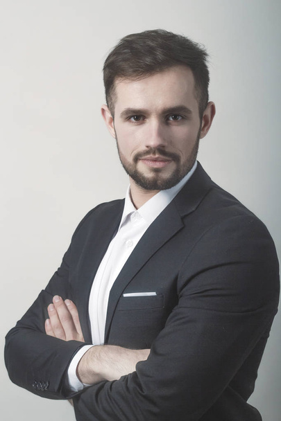 confident modern businessman.isolated on gray background - Fotografie, Obrázek