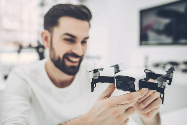 Man in quadcopter store - Photo, Image