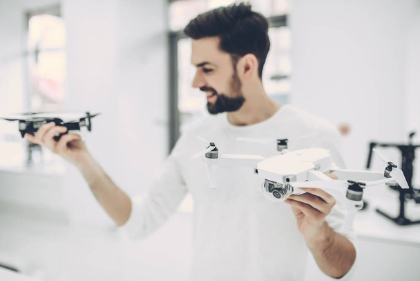 Man in quadcopter store - Photo, image