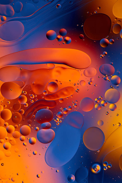 oil drops on a water surface abstract background - Foto, Bild