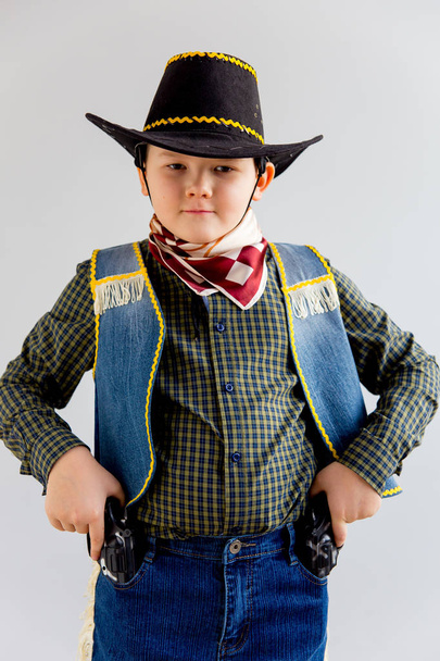 Boy in a cowboy costume - Φωτογραφία, εικόνα