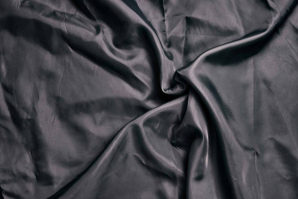 Smooth elegant black silk or satin luxury cloth texture. Retro style. - Photo, Image