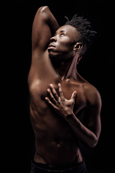 portrait of African-American man on black background - Valokuva, kuva