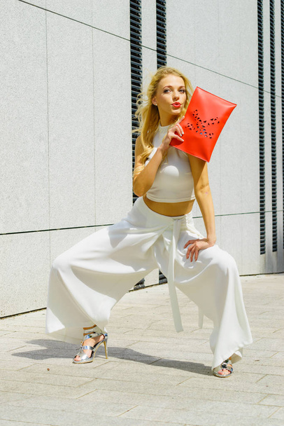 Woman wearing crop top and culottes - Photo, image