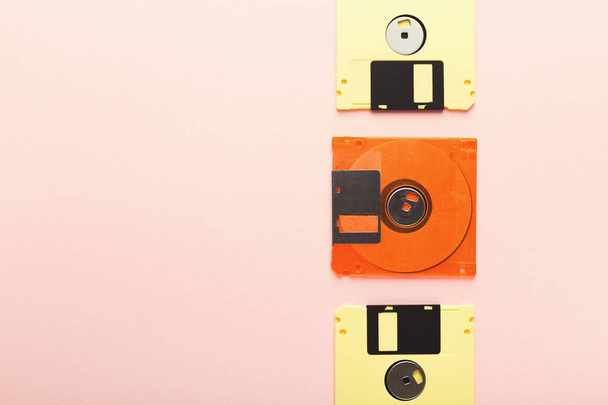 Creative background with floppy disks of different colors - Foto, Bild