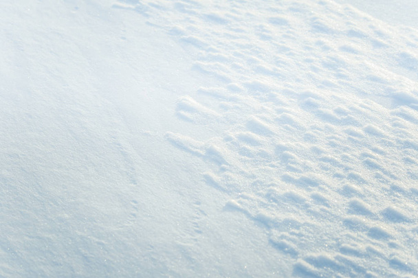 Beautiful fresh snow pattern in minimalistic style. Winter background. Norway, Northern Europe. Close up texture - Photo, Image
