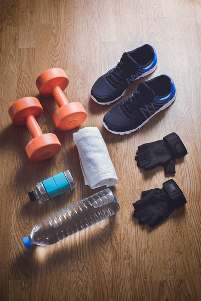 Fitness equipment on wooden background - Photo, Image