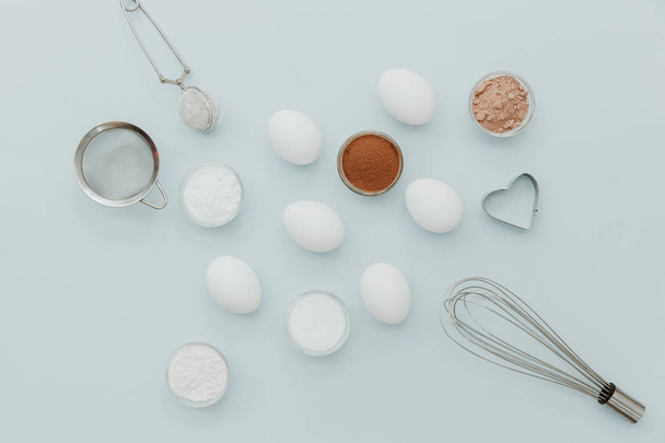 Flat lay Ingredients background: fresh eggs for baking on pastel background, top view, copy-space - Photo, Image