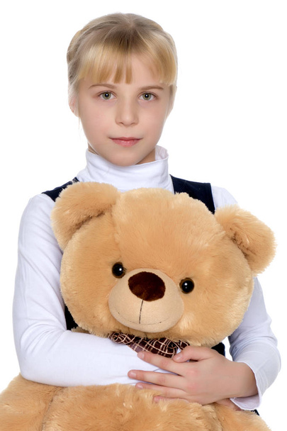 Little girl with teddy bear - Foto, afbeelding