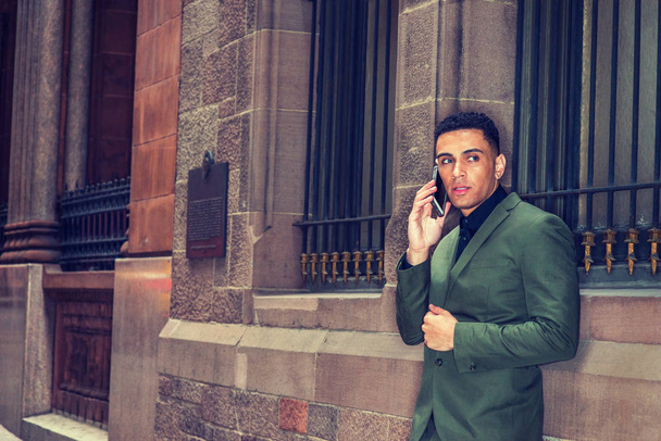 Young American businessman calling on cell phone outdoor in New  - Fotoğraf, Görsel