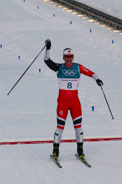 PYEONGCHANG, SOUTH KOREA - FEBRUARY 10, 2018: The most-decorated Winter Olympian in history Marit Bjoergen of Norway at mass start in the Ladies' 7.5km + 7.5km Skiathlon at the 2018 Winter Olympics - Photo, image