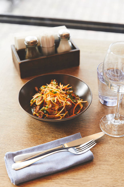 Hot delicious udon noodles with pork on restaurant table - Fotografie, Obrázek