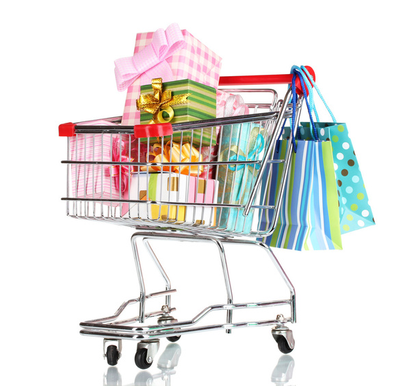 shopping cart with bright gifts and paper bags isolated on white - Foto, afbeelding