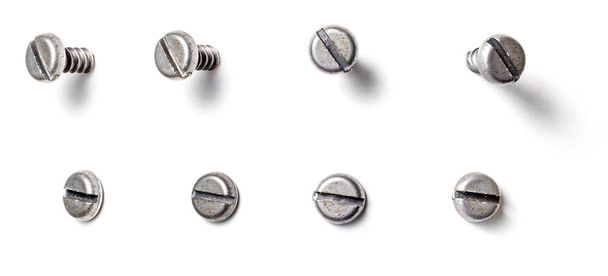 A slotted screw from different perspectives on a white backgroun - Photo, Image