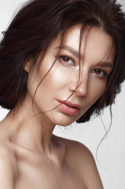 Beautiful woman with a light natural make-up and perfect skin . Beauty face. - 写真・画像