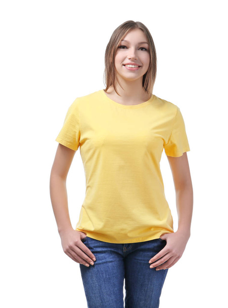 Young woman in stylish t-shirt on white background. Mockup for design - Fotó, kép