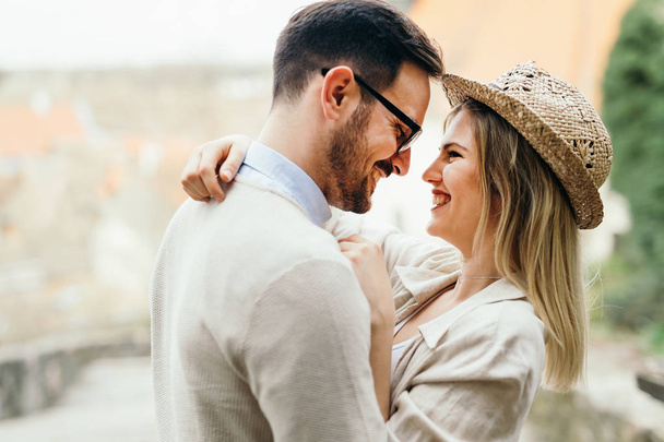 Happy couple in love smiling and dating outdoor - Fotoğraf, Görsel