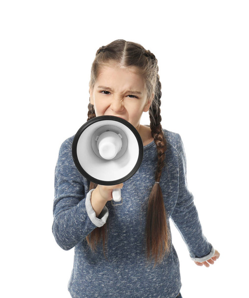 Angry little girl shouting into megaphone on white background - Fotó, kép