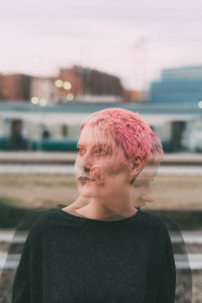 double exposure portrait young woman pink hair -  creative, artistic concept - 写真・画像