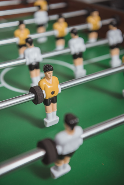close up of table soccer with football players silhouettes - Foto, Imagem
