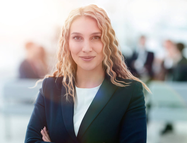 portrait of successful business woman on the background of the office - Фото, зображення