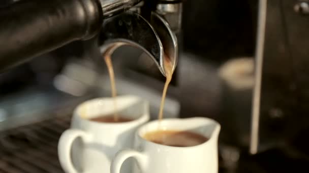 Waiter to make double coffee on a coffee machine - Footage, Video
