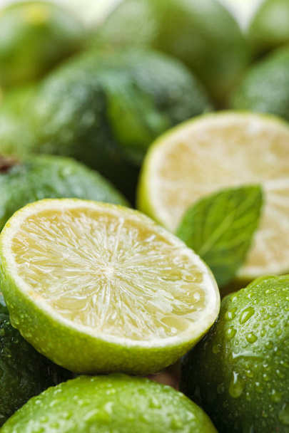 Wet limes and mint. - Photo, Image