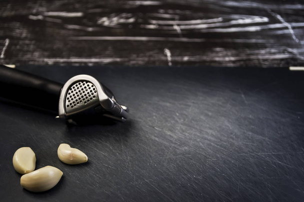 A composition of cloves of garlic on the table. Healthy eating.  - 写真・画像