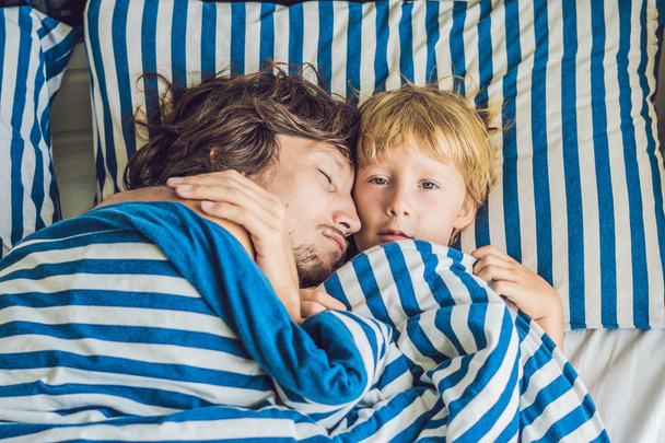 the father sleeping with son. Joint dream with the child concept - Φωτογραφία, εικόνα