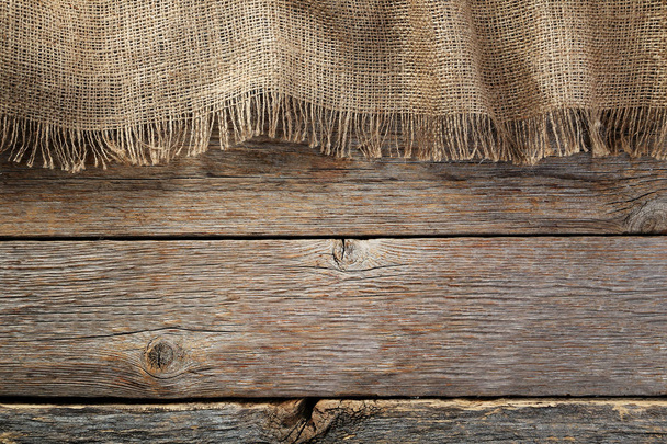 Sackcloth texture on grey wooden table - Valokuva, kuva