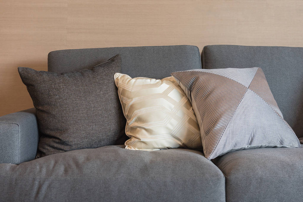 set of pillows on dark color elegance sofa  - Foto, imagen