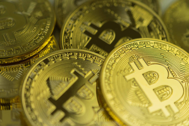 Extreme close up of Golden Bitcoin Coin Bitcoin cryptocurrency. Business concept. - 写真・画像
