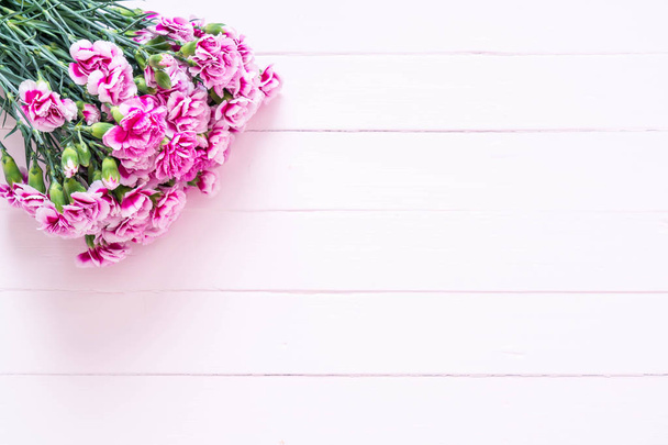 pink spring flower on wooden background - Foto, Imagen