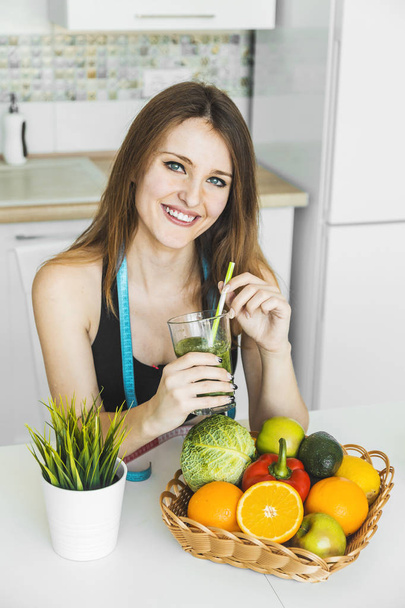 Woman with Green Smoothie - Фото, изображение