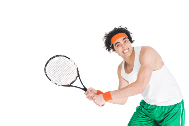 Thin tennis player exercising with racket isolated on white - Фото, зображення