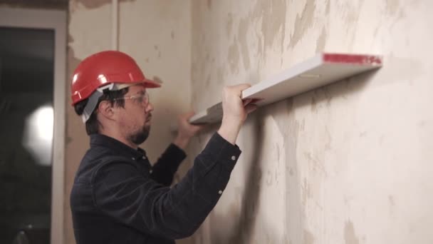 Építő van korlátozás szintjének javítása lapos beltéri falak - Felvétel, videó