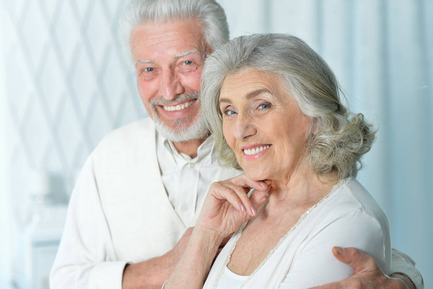 portrait of a happy senior couple posing   at home - Фото, изображение